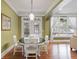 Cozy dining area with hardwood floors and bright windows at 1605 Pavillion Ridge Se Dr, Smyrna, GA 30080