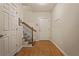 Welcoming entryway with hardwood floors, stairs to the upper level, and a front door at 1605 Pavillion Ridge Se Dr, Smyrna, GA 30080