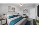 Modern bedroom with stylish furniture, a comfortable bed, and artistic décor for a serene retreat at 1640 Fairburn Sw Rd, Atlanta, GA 30331