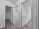 Bright hallway with multiple doorways leading to different rooms in the home at 1640 Fairburn Sw Rd, Atlanta, GA 30331
