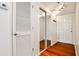 Entryway with closet and mirrored doors showing hardwood floors and neutral wall paint at 275 13Th Ne St # 605, Atlanta, GA 30309
