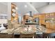 Bright kitchen featuring granite countertops, stainless steel appliances, a central island, and ample cabinet space at 3030 Heatherstone Dr, Cumming, GA 30041