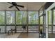 Enjoy this inviting screened-in porch with wooded views, perfect for relaxing or entertaining guests at 3030 Heatherstone Dr, Cumming, GA 30041