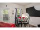 Cozy dining area with modern decor, sleek furniture, and plenty of natural light at 1296 Taylor Way, Stone Mountain, GA 30083