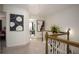 Bright hallway with neutral walls, plush carpeting, and tasteful decor at 1296 Taylor Way, Stone Mountain, GA 30083