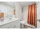 Clean bathroom with a shower-tub combo and a modern vanity sink at 173 Kingswood Dr, Ellenwood, GA 30294
