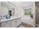 Main bathroom features double vanity, shower, walk-in closet and soaking tub at 173 Kingswood Dr, Ellenwood, GA 30294
