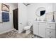 Modern bathroom with white vanity, updated fixtures, and neutral decor at 173 Kingswood Dr, Ellenwood, GA 30294
