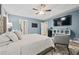Large main bedroom with vaulted ceilings, fan, television and easy access to ensuite at 173 Kingswood Dr, Ellenwood, GA 30294