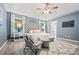 Well appointed main bedroom with vaulted ceiling, ceiling fan and natural light at 173 Kingswood Dr, Ellenwood, GA 30294