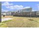 A spacious backyard with a wooden fence and a concrete patio area, perfect for outdoor gatherings at 2349 Hanover Woods Rd, Lithonia, GA 30058