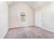 Bedroom with vaulted ceiling, a window with a view, and neutral colored walls at 2349 Hanover Woods Rd, Lithonia, GA 30058