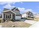 Beautiful two-story home with a well-manicured lawn and a two-car garage in a desirable neighborhood at 2349 Hanover Woods Rd, Lithonia, GA 30058