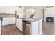 Modern kitchen with granite countertops, stainless steel appliances, and white cabinets, perfect for culinary enthusiasts at 2349 Hanover Woods Rd, Lithonia, GA 30058