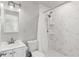 This bathroom has a white vanity, toilet and shower with shower caddy at 313 Yancy Se Dr, Marietta, GA 30067