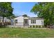 Charming renovated home with a cozy front porch and freshly landscaped front yard at 313 Yancy Se Dr, Marietta, GA 30067