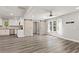 Bright and open living area with wood floors and stainless steel appliances in the kitchen at 313 Yancy Se Dr, Marietta, GA 30067