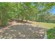 Lush backyard with mature trees and a well maintained lawn at 91 Davis Mill Ct, Lawrenceville, GA 30044