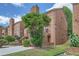Charming brick townhouse with well-maintained landscaping and inviting entrance, perfect for comfortable living at 91 Davis Mill Ct, Lawrenceville, GA 30044
