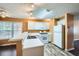 Bright kitchen featuring white cabinets, modern appliances, and a cozy eat-in area at 91 Davis Mill Ct, Lawrenceville, GA 30044