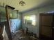 Basement needs renovation, with utility equipment and access door to the exterior at 1417 Richland Rd, Atlanta, GA 30310