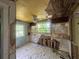 Bedroom with peeling paint and ceiling damage at 1417 Richland Rd, Atlanta, GA 30310