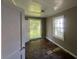 Bedroom with two windows offering natural light, ready for customization and renovation at 1417 Richland Rd, Atlanta, GA 30310