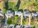 Aerial view of a neighborhood showcasing mature trees and well-maintained lawns at 1468 North Amanda Cir, Atlanta, GA 30329