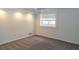 Bedroom with carpet, a window, and a ceiling fan with recessed lighting at 1468 North Amanda Cir, Atlanta, GA 30329