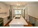 Contemporary kitchen with white cabinetry, stainless steel appliances, and an island at 1468 North Amanda Cir, Atlanta, GA 30329