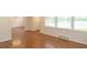 Open living room area with hardwood floors and lots of natural light at 1468 North Amanda Cir, Atlanta, GA 30329