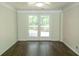 A modern living room with doors to a deck at 1468 North Amanda Cir, Atlanta, GA 30329