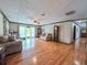 Large living room with hardwood flooring and abundant natural light at 2100 Highway 138 E E, Stockbridge, GA 30281
