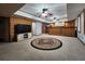 Spacious finished basement featuring entertainment area, bar, and adjacent seating at 1225 Creek Laurel Dr, Lawrenceville, GA 30043