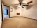 Bedroom with ceiling fan and neutral walls, carpeted and door to other spaces at 1225 Creek Laurel Dr, Lawrenceville, GA 30043
