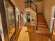 Inviting foyer with hardwood floors, staircase, and decorative glass front door at 1225 Creek Laurel Dr, Lawrenceville, GA 30043