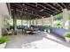 Spacious outdoor patio area perfect for dining and entertaining with recessed lighting at 3627 Groovers Lake Rd, Lithia Springs, GA 30122