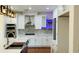 Modern kitchen featuring stainless steel appliances, white cabinets, and a kitchen island at 4260 Hammond Bridge Dr, Suwanee, GA 30024
