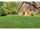 Expansive backyard offers plenty of space for outdoor activities and enjoying the serene surroundings at 4615 Gresham Rd, Douglasville, GA 30134