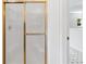 The bathroom showcases a golden framed sliding glass shower door at 4615 Gresham Rd, Douglasville, GA 30134