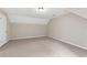 Clean, carpeted bedroom with neutral walls and trim and with single overhead light at 4615 Gresham Rd, Douglasville, GA 30134