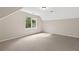 Spacious room featuring neutral carpeting, and a window at 4615 Gresham Rd, Douglasville, GA 30134