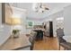 A view of the kitchen with stainless appliances and an island with seating at 4615 Gresham Rd, Douglasville, GA 30134