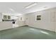 Bright and airy living room adjacent to a cozy kitchen area at 4615 Gresham Rd, Douglasville, GA 30134