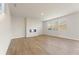 Well-lit living room showcases a modern fireplace and large windows for ample natural light at 5599 Rosehall Pl, Atlanta, GA 30349