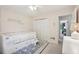 Comfortable bedroom features a daybed, large closet, and tasteful decor for a functional and appealing space at 120 Park Bridge Ln, Roswell, GA 30075
