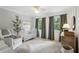 Cozy Bedroom with crib, chair, and natural light from large windows at 120 Park Bridge Ln, Roswell, GA 30075