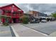 Street view of Mac McGee and other restaurants and shops in the area, showcasing the vibrant local community at 120 Park Bridge Ln, Roswell, GA 30075