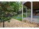 Multi-level backyard with stone patio, manicured landscaping, and privacy fence at 1720 Buckhead Valley Ne Ln, Atlanta, GA 30324