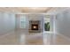 Basement area features stone fireplace with exit door to exterior at 1720 Buckhead Valley Ne Ln, Atlanta, GA 30324